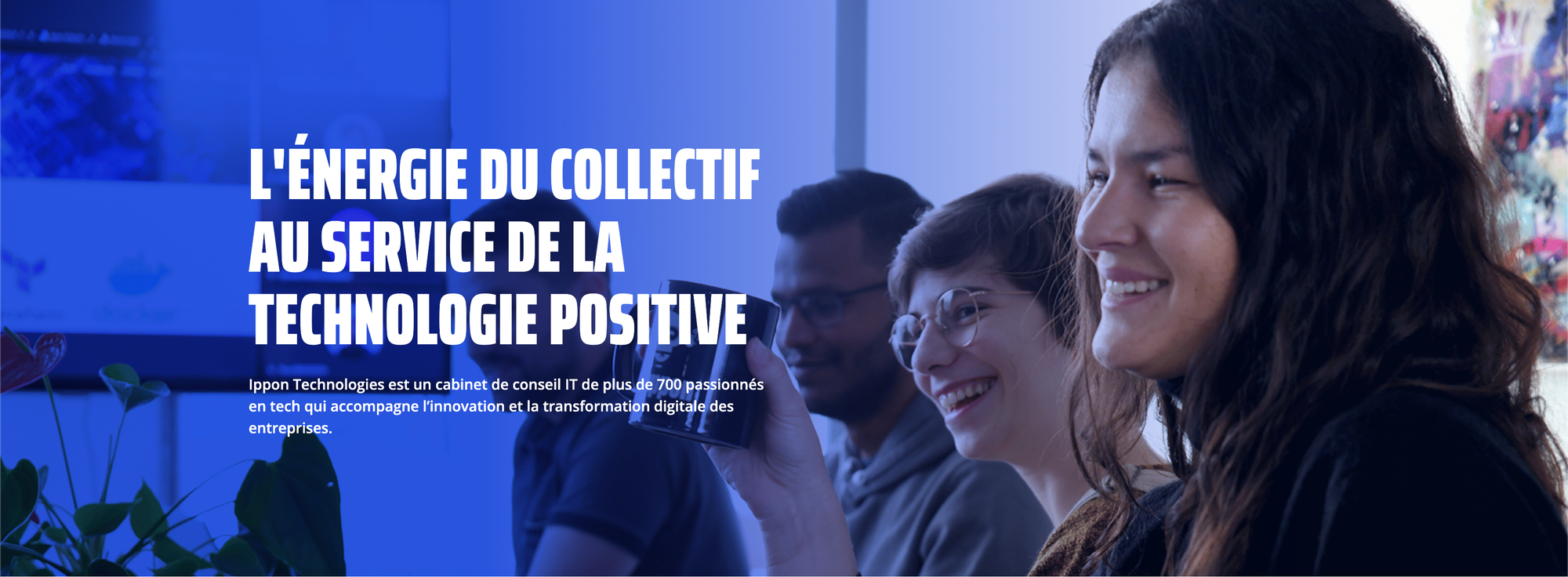 Bannière du site internet https://fr.ippon.tech/ qui représente des collaborateurs qui sourient.